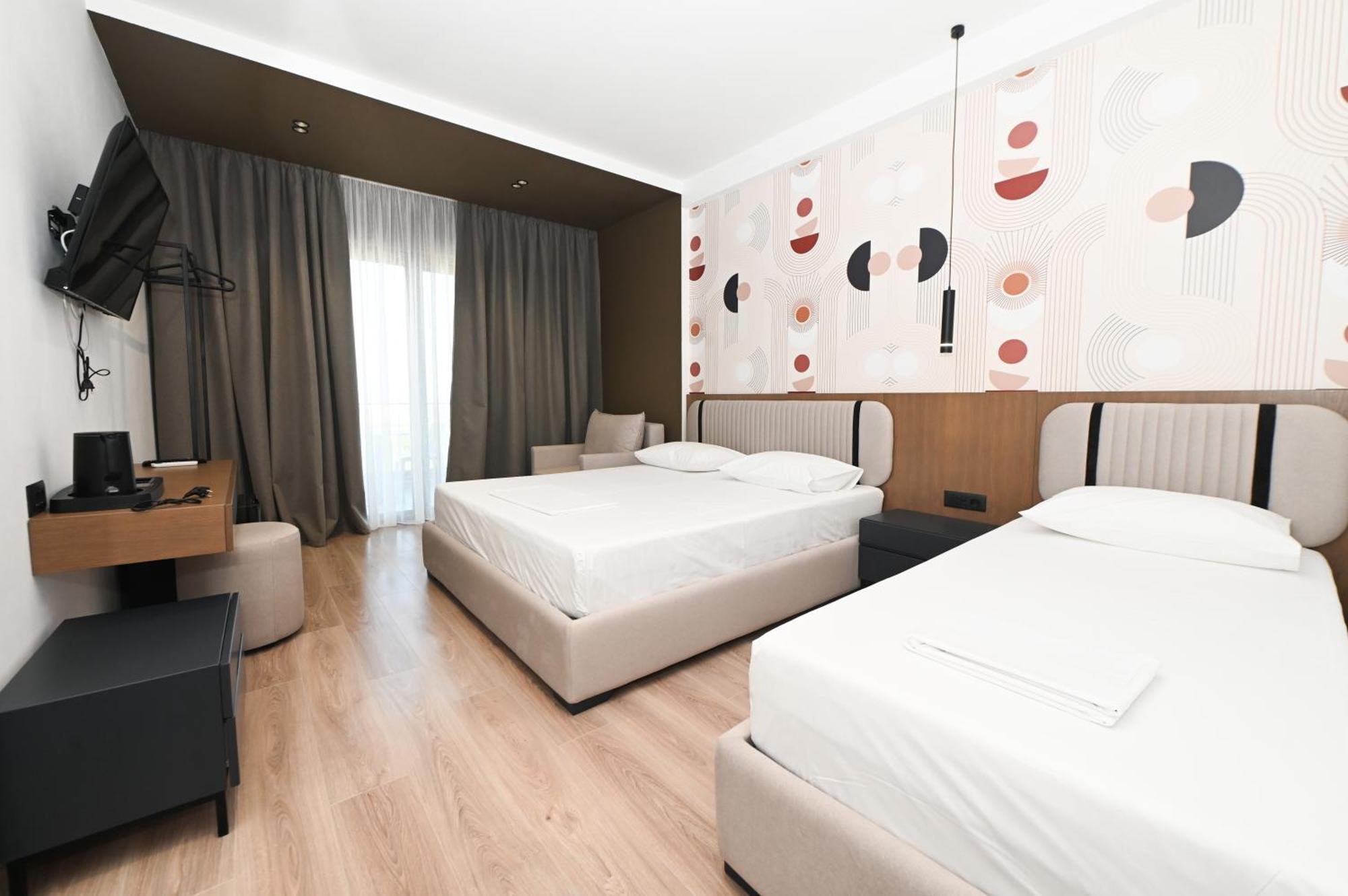 Monun Hotel Ксамил Экстерьер фото