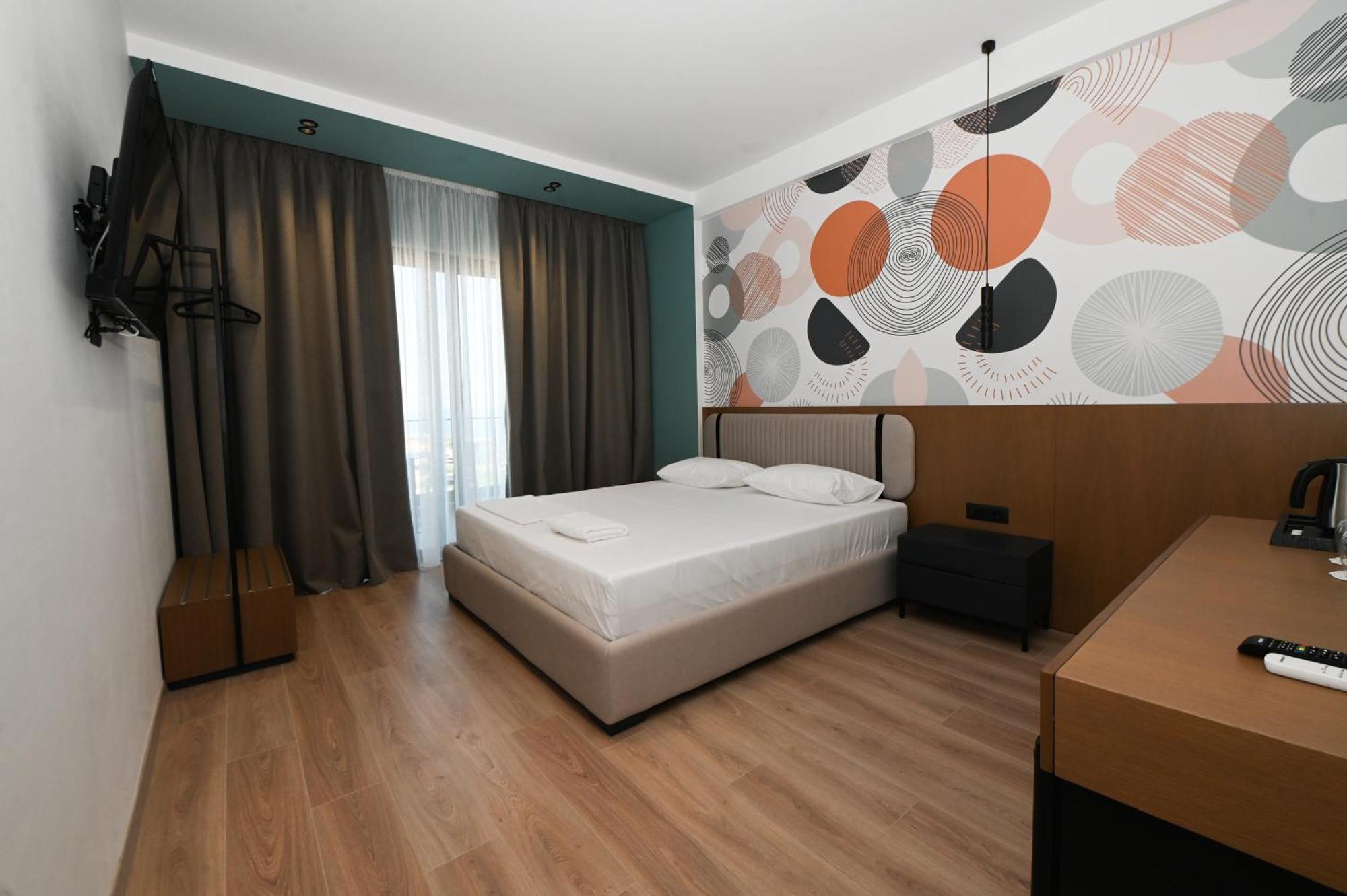 Monun Hotel Ксамил Экстерьер фото