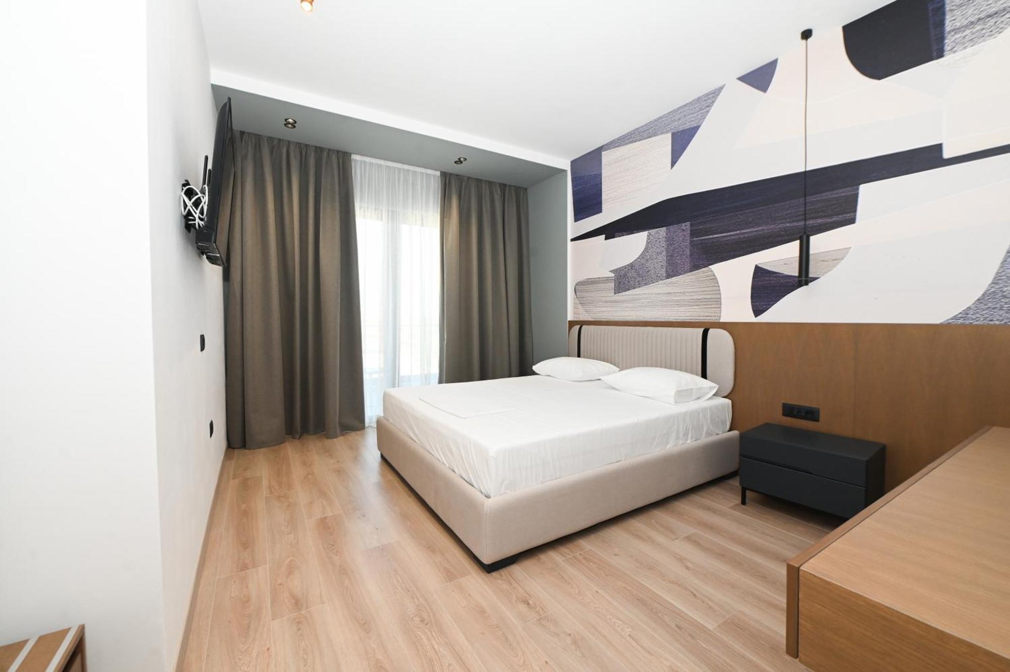 Monun Hotel Ксамил Экстерьер фото