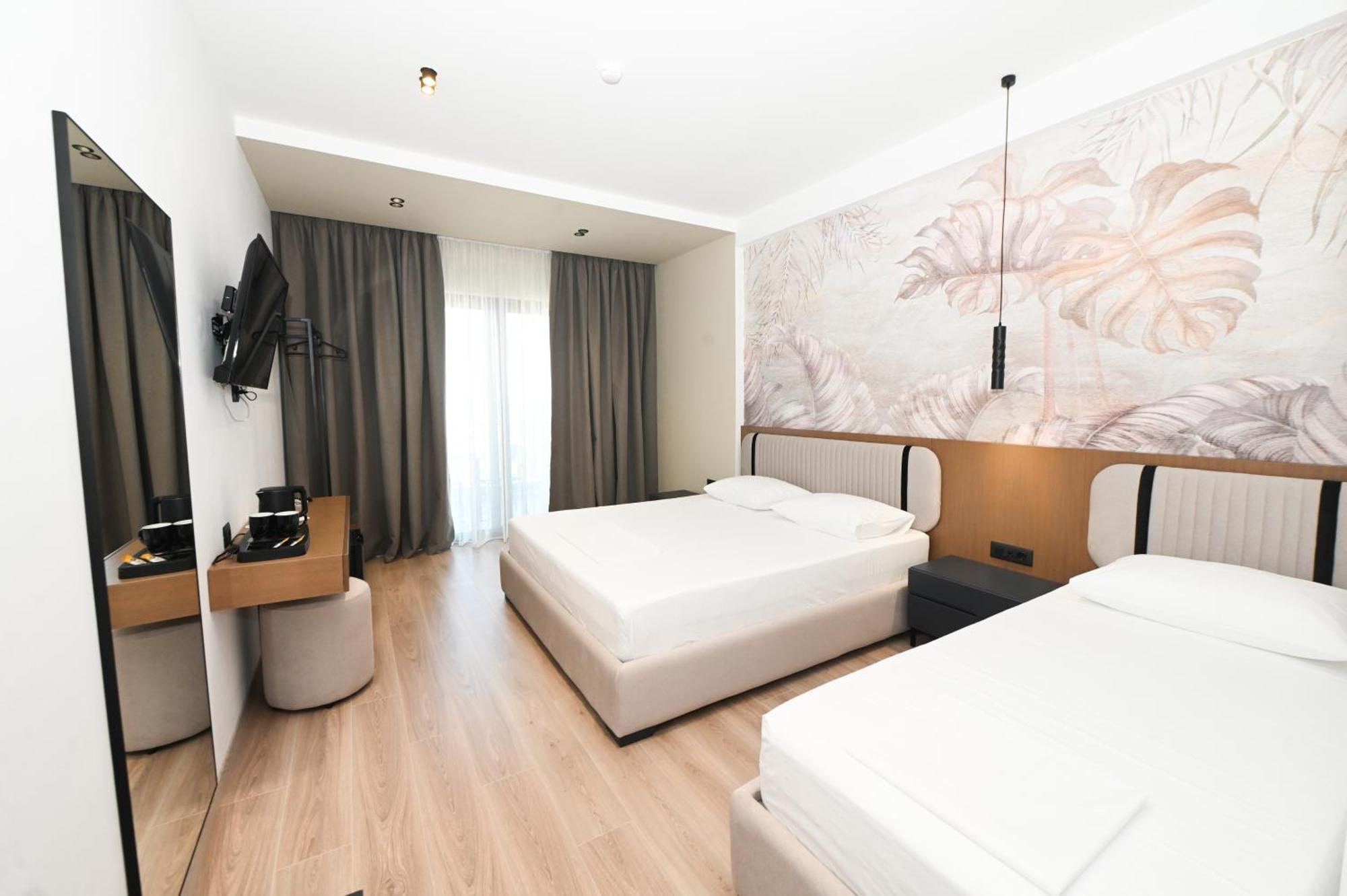 Monun Hotel Ксамил Экстерьер фото
