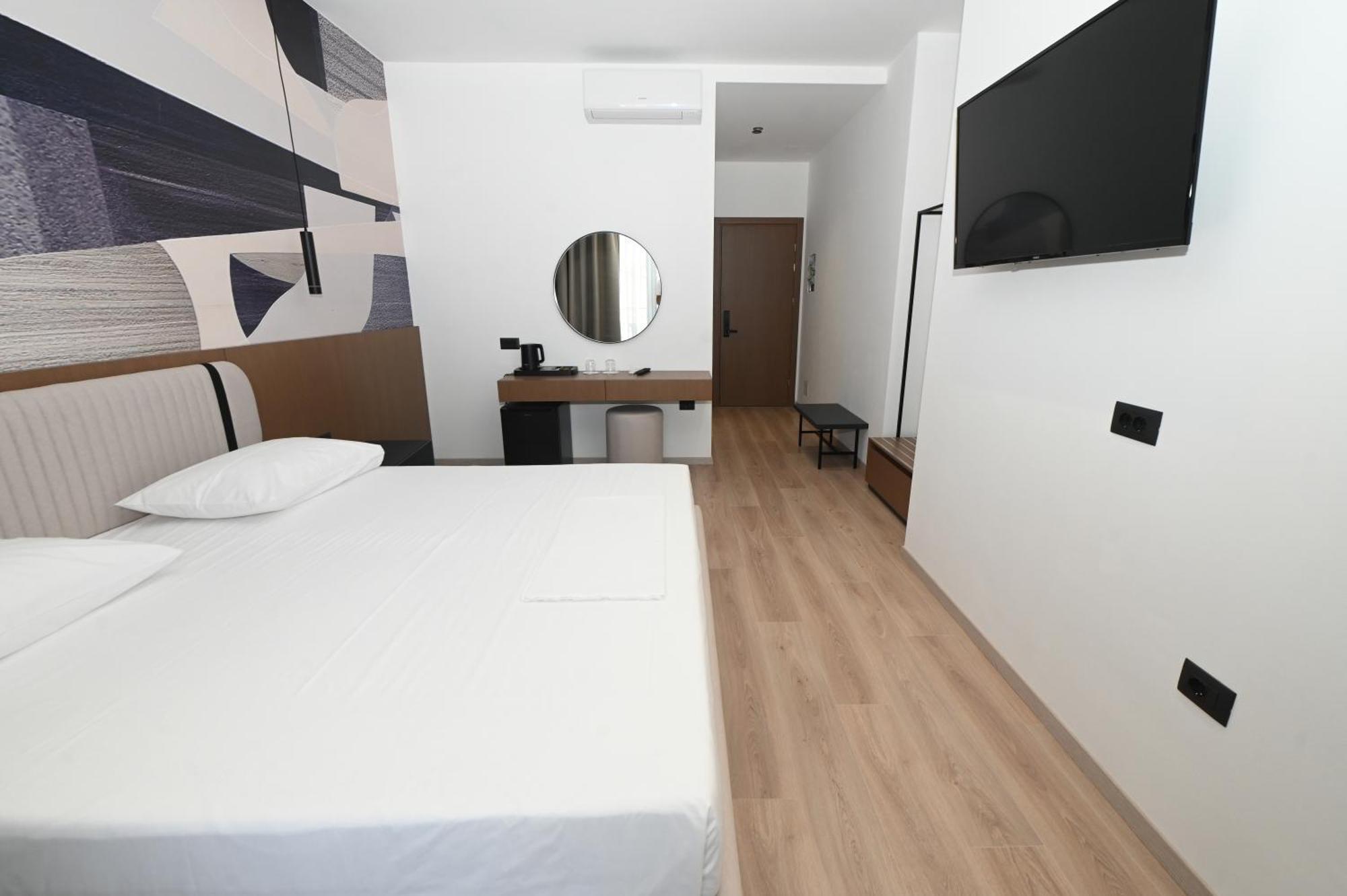 Monun Hotel Ксамил Экстерьер фото