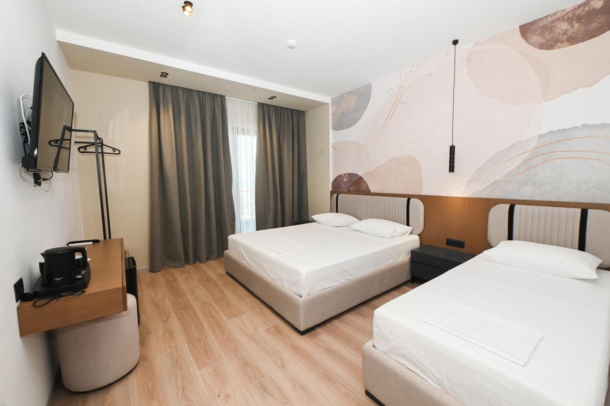 Monun Hotel Ксамил Экстерьер фото