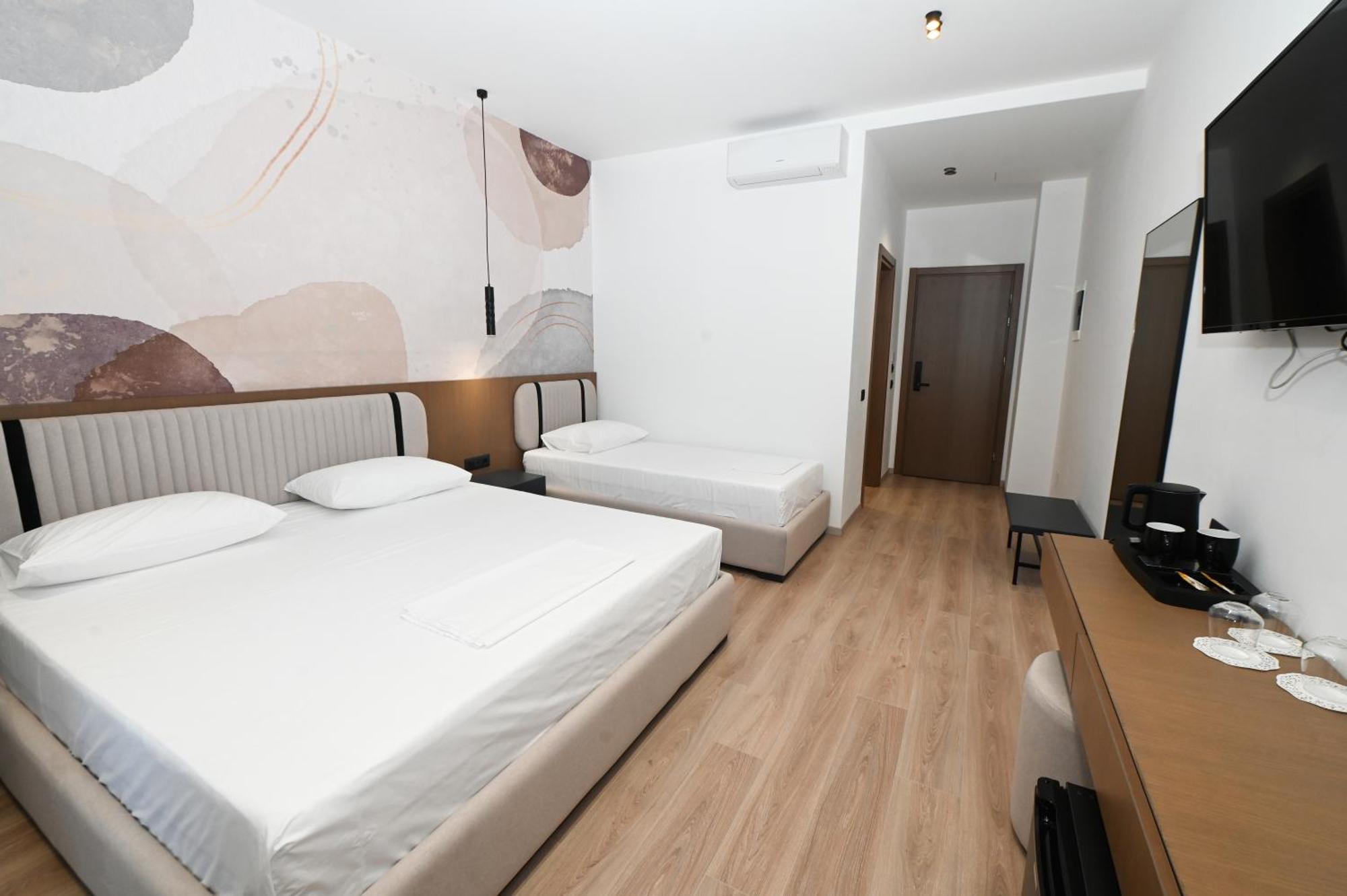 Monun Hotel Ксамил Экстерьер фото