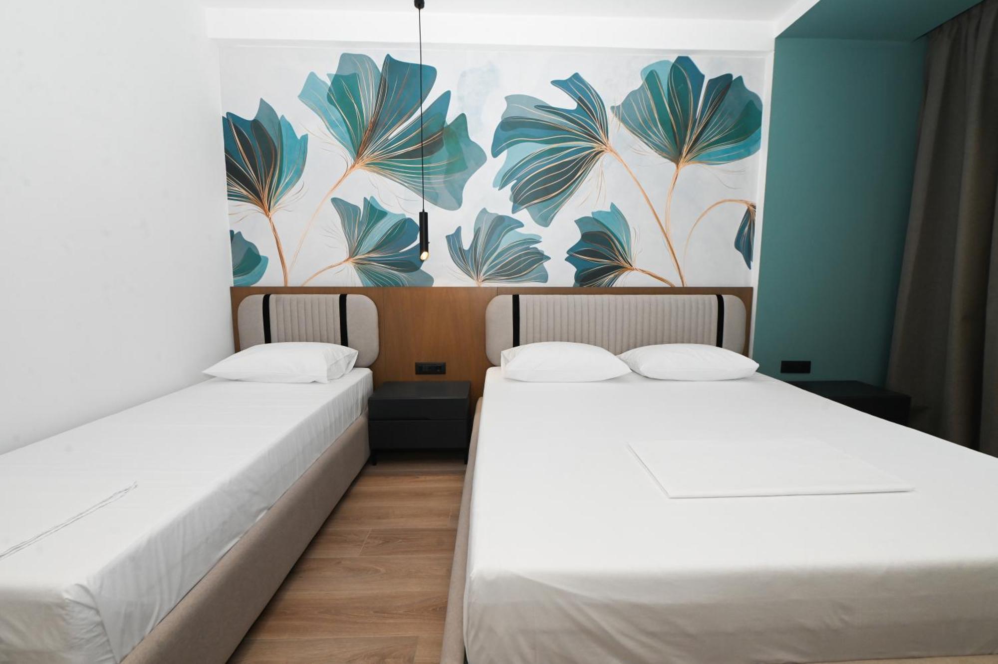 Monun Hotel Ксамил Экстерьер фото