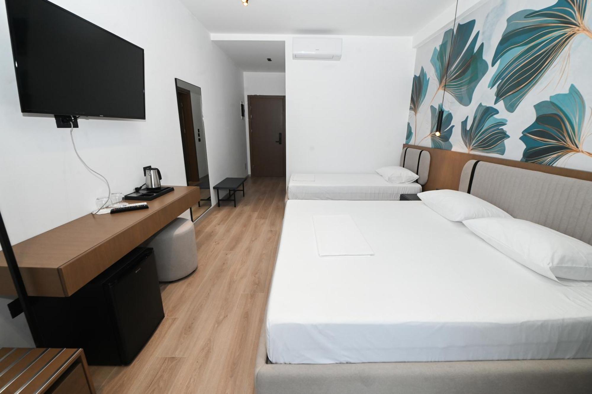 Monun Hotel Ксамил Экстерьер фото