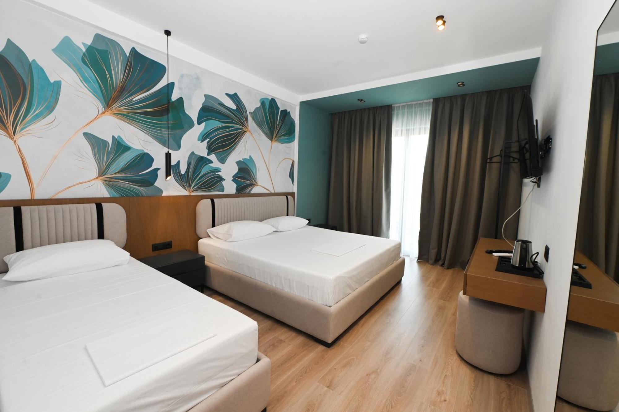 Monun Hotel Ксамил Экстерьер фото